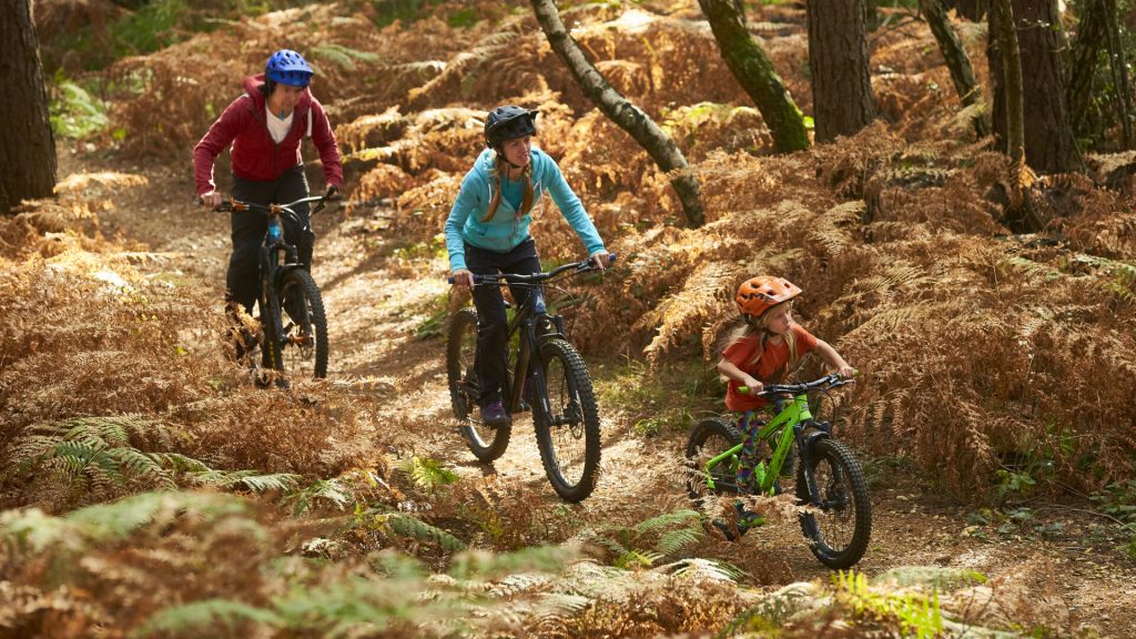 Family riding the green trail